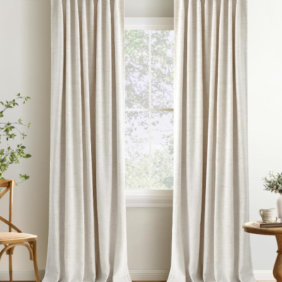Cream-toned cotton-linen blackout curtains (2-panel set); multiple header styles available; thermal-insulating and light-blocking.