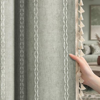 Sage green Bohemian-style cotton-linen blackout curtains (2-panel set); features embroidered tassel texture; vintage pastoral style for living rooms and bedrooms.